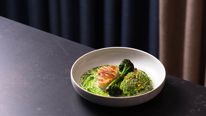 Baked Skrei cod, grilled Savoy cabbage, charred broccoli, white wine sauce with buttermilk and cavia