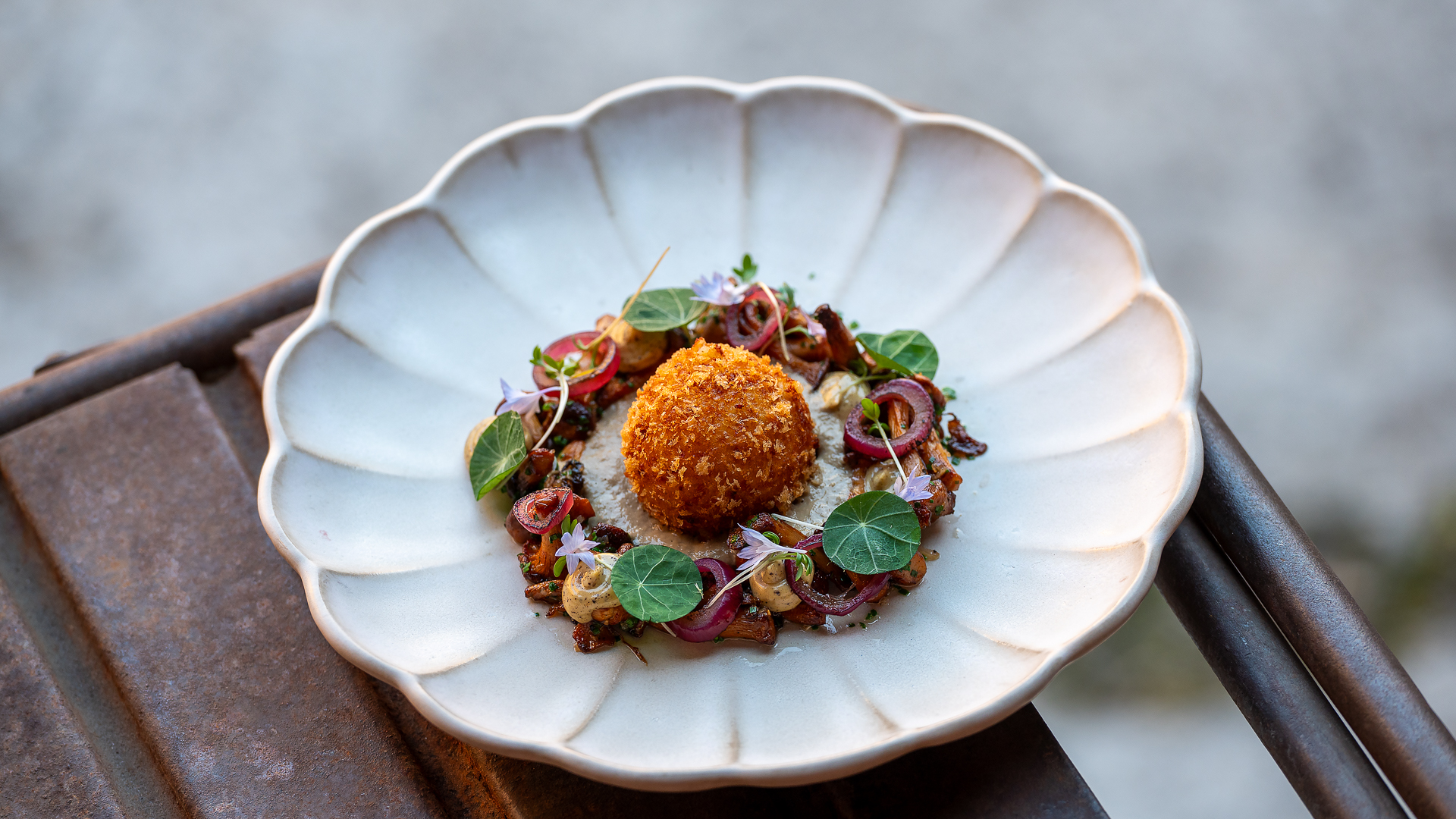Crispy croquette with charred sweetcorn, chanterelles, mushroom mayo, spruce shoots and mushroom foa